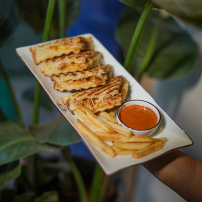 Golden. Gooey. Grilled to perfection. Grilled cheese sandwich with fries and dip
